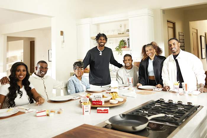 Deion Sanders and family on set of KFC commercial